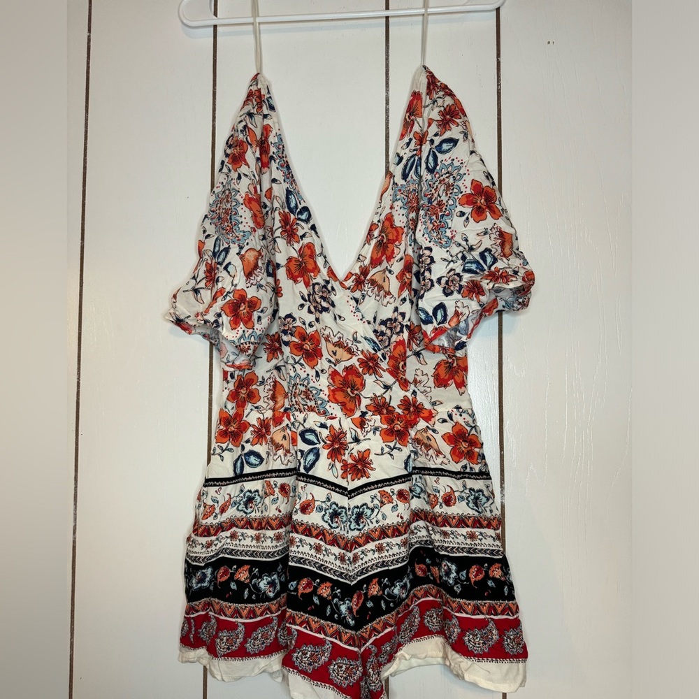 Blue Rain size XS romper.